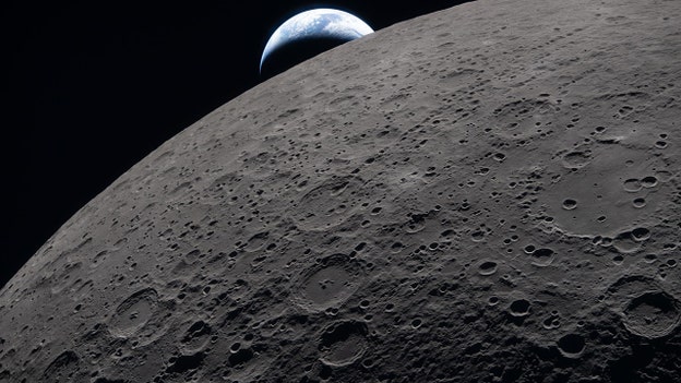 New photo shows Earth setting behind moon minutes before Artemis II fully passes to its dark side