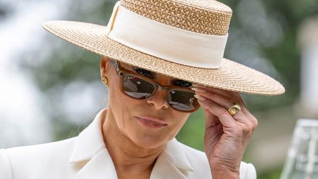 Melania Trump tries on Meta smart glasses during royal visit event