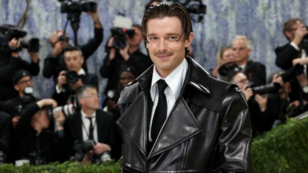 Patrick Schwarzenegger wears corseted look to the Met Gala