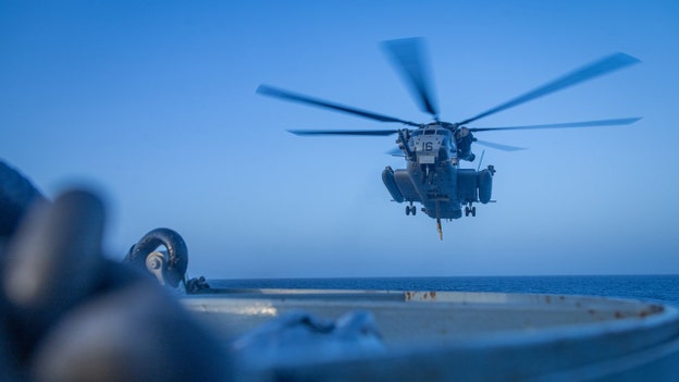 US military helicopter lands on USS Tripoli during Operation Epic Fury