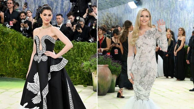 Anne Hathaway, Lindsay Vonn stun on Met Gala red carpet