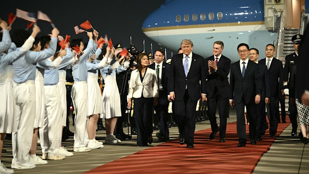 Air Force One delegation touches down in Beijing, Trump walks red carpet at 8:08 am ET