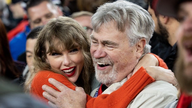 Travis Kelce's dad calls Taylor Swift 'the girl next door'