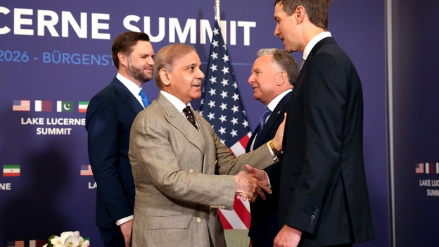 Vice President JD Vance, left, looks on with U.S. President Donald Trump's special envoy Steve Witkoff, second from right, while Pakistan's Prime Minister Shehbaz Sharif, center, shakes hands with Trump's son-in-law Jared Kushner, as they high-level talks aimed at advancing a deal to end the Middle East conflict, at the Bürgenstock Resort in Obbuergen, Switzerland, Sunday, June 21, 2026. (Nathan Howard/Pool Photo via AP)