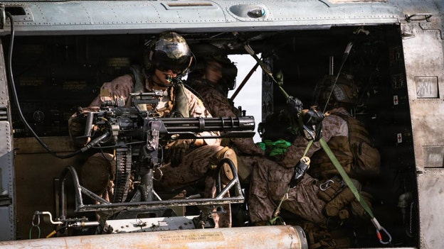 CENTCOM loads military copter for aerial sniper mission on Arabian Sea in daring new photos