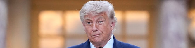 President Donald Trump shows how HUGE the deal signing is