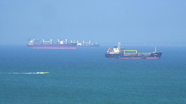 Iran fires missiles at commercial ships in Strait of Hormuz: report