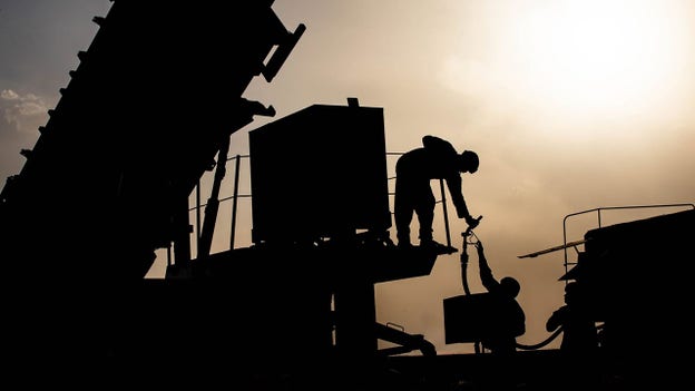 CENTCOM releases image of US troops refueling generator at Middle East base