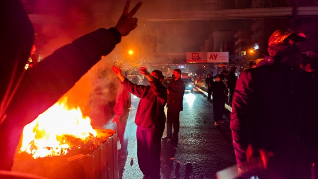 Iranian writer recounts staying awake as protesters faced execution at dawn