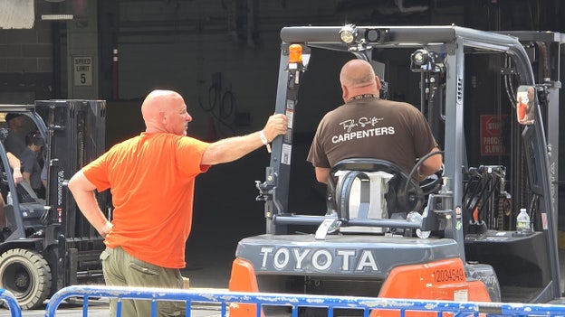 Worker's 'Taylor Swift Carpenters' T-shirt turns heads during wedding setup