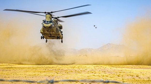 US Army helicopter prepares to land in Middle East in photo released by CENTCOM