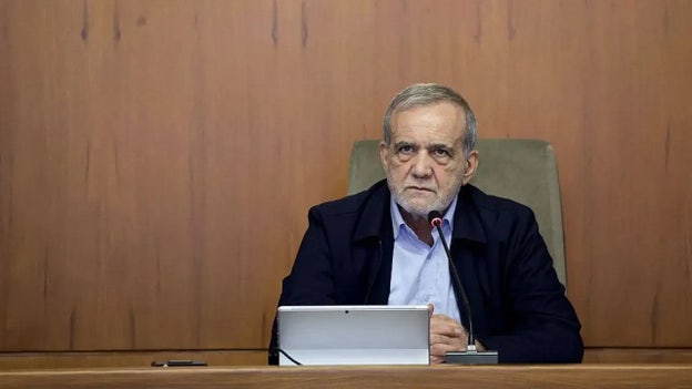 Iranian president rejects resignation rumors, vows to 'stand firm'