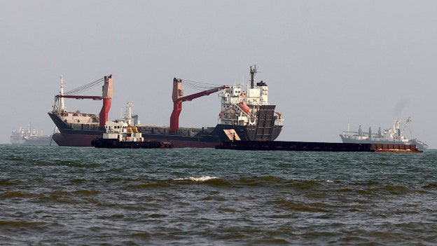 Ship traveling in Strait of Hormuz is hit with ‘unknown projectile,’ UK maritime agency says