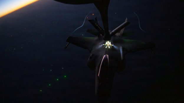 US stealth fighter jet refuels over Middle East in photo released by CENTCOM