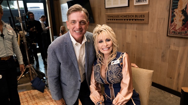 Commissioner Mark Ezell and Dolly Parton (Courtesy of Dolly Parton)