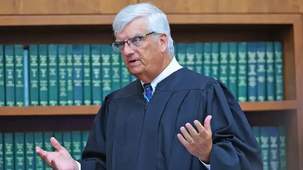 Judge, lawyers discuss jury question out of earshot as mom awaits her fate
