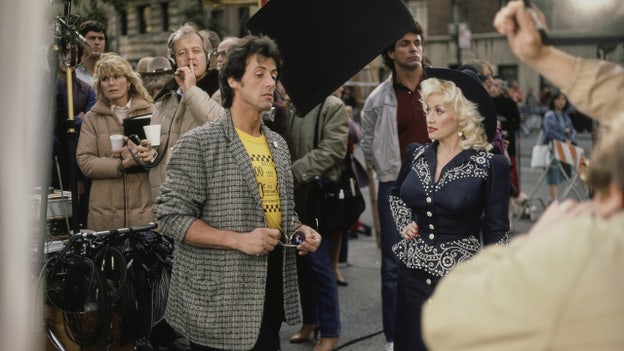 Dolly Parton and Sylvester Stallone on the set of "Rhinestone." (Getty Images)