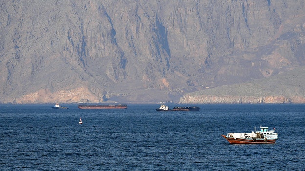 Projectile strikes tanker in Strait of Hormuz, injuring 2 crew members, UKMTO says