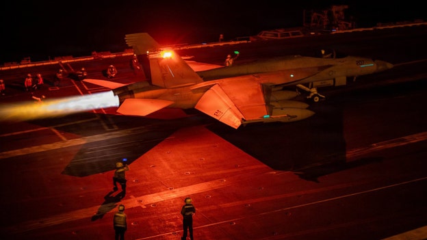 US fighter jet takes off from aircraft carrier stationed in Middle East during Operation Epic Fury