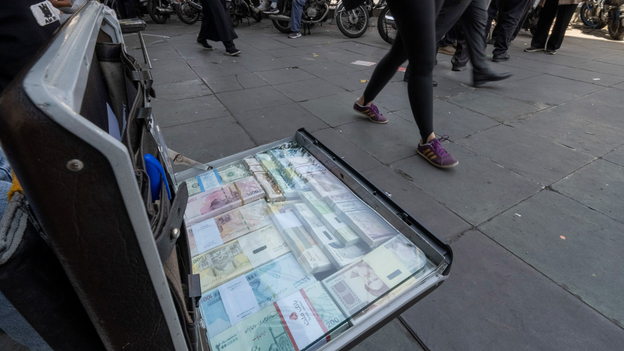 Iran's currency drops to record low of 2.2 million rials to the dollar