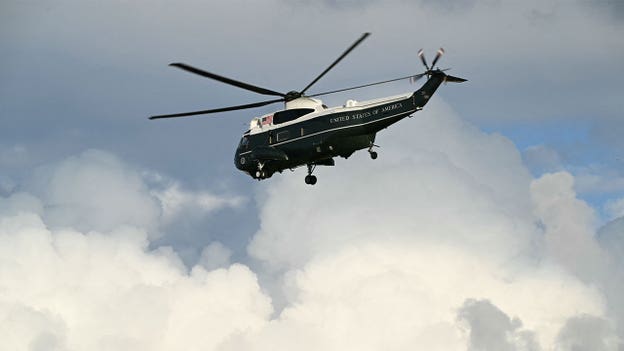 Trump returns to White House after leaving Camp David earlier than expected