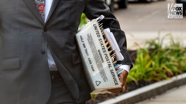 A close-up shot of a box of mail being carried by Kevin J. Reddington as he arrives to Plymouth Superior Court, he says the mail is for his client Lindsay Clancy, Plymouth, Mass., Thursday, September, 3, 2026. Clancy is on trial for the murder of her three children in 2023. (David McGlynn for Fox News Digital)