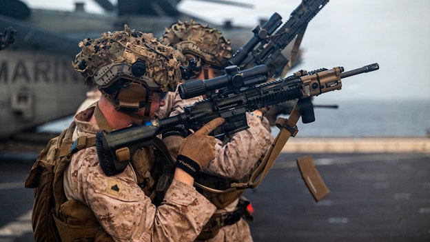 US Marines train on flight deck of USS Portland