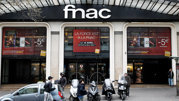 Major European retailer says France unrest damaged about a dozen stores