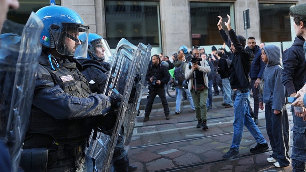 People march through the streets of Milan, Italy, on Saturday, Oct. 24, 2026. (Antonio Calanni/AP)