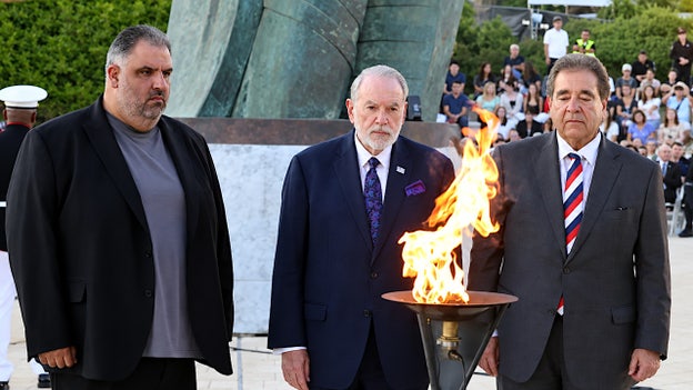 The Jewish National Fund-USA held a 25th anniversary 9/11 commemoration at the site featuring U.S. Ambassador to Israel Mike Huckabee (middle). (Jewish National Fund-USA)