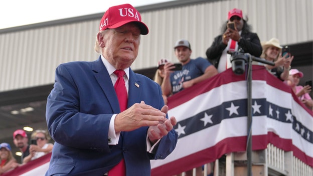 Trump takes midterm campaign to Kansas as GOP defends Senate seat
