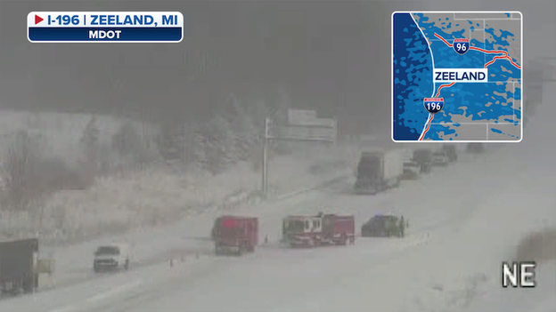 Michigan DOT camera shows snow falling as crews work massive pileup in Michigan