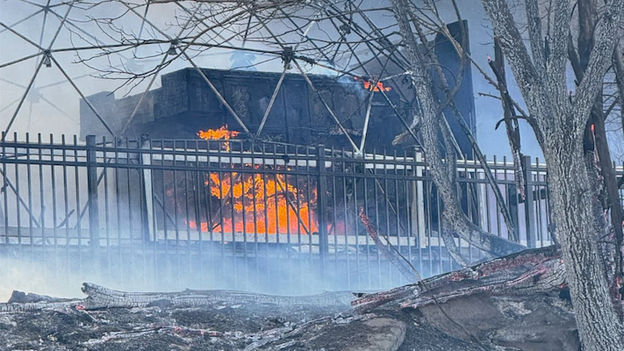 I-25 shut down in Colorado as crews battle grass fire, nearby high school evacuated