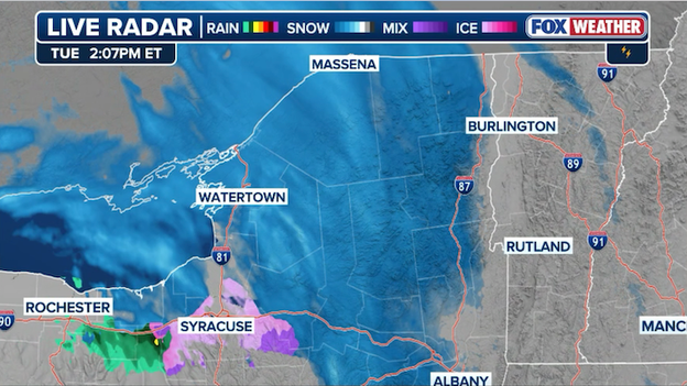 Light snow sliding through Upstate New York ahead of fast-moving clipper
