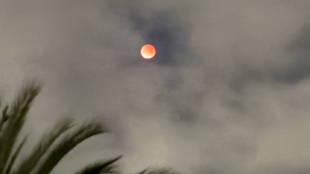 Blood Moon plays peek-a-boo with California clouds