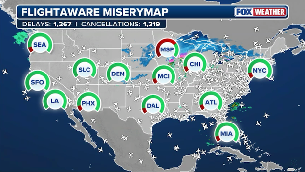 Flight disruptions climb past 2,500 as blizzard 'bomb' slams major hubs