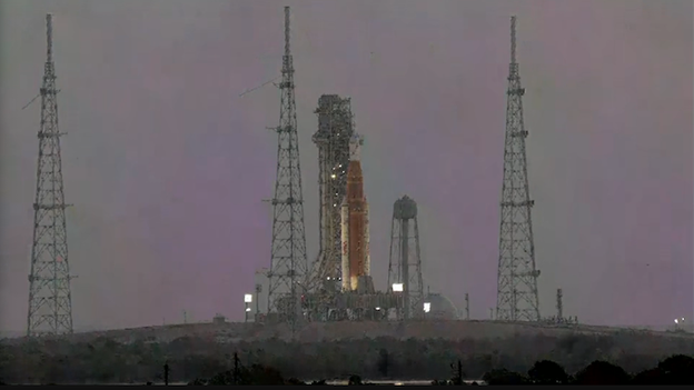 Sun rises over Artemis II rocket at Kennedy Space Center
