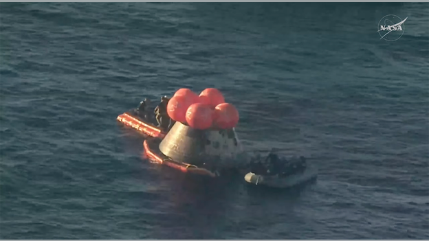 Confirming all four Artemis II astronauts have exited the spacecraft
