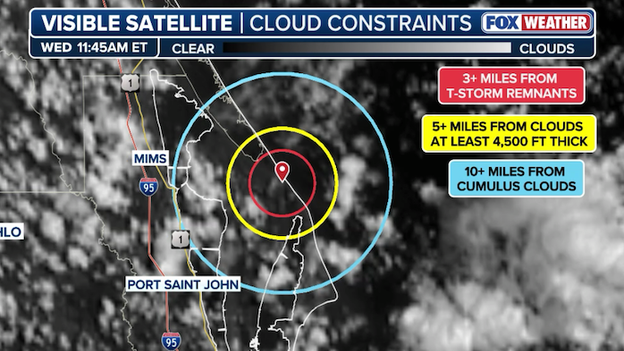 Clouds bubble up over Kennedy Space Center as meteorologists monitor launch rules