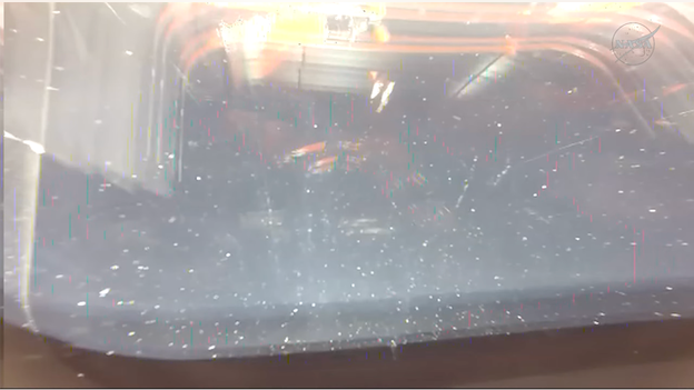 Gazing out the Integrity viewport as space slips away