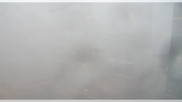 Downtown Chicago skyline disappears as dangerous storms slam the city