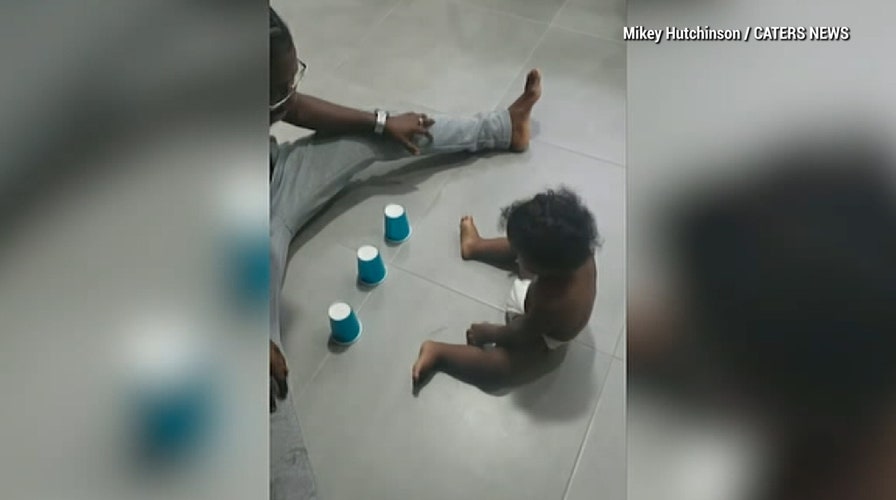 Toddler, 1, masters three-cup game against dad in viral video