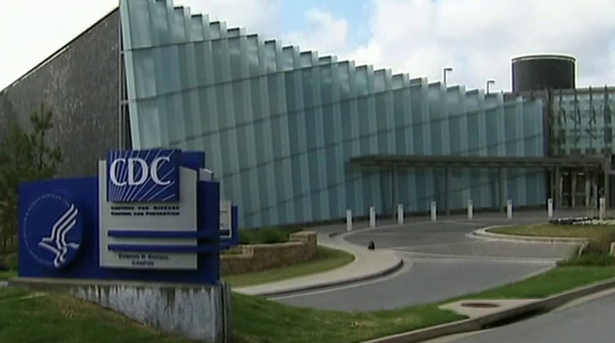 Trump signs coronavirus spending bill, cancels CDC visit