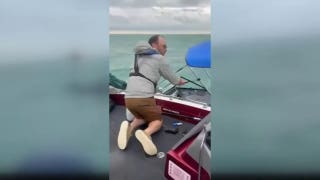 Good Samaritan races to rescue three men after fishing boat starts sinking