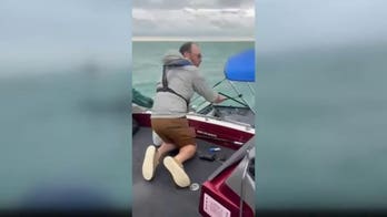 Good Samaritan races to rescue three men after fishing boat starts sinking