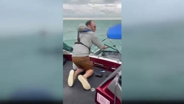 Good Samaritan races to rescue three men after fishing boat starts sinking
