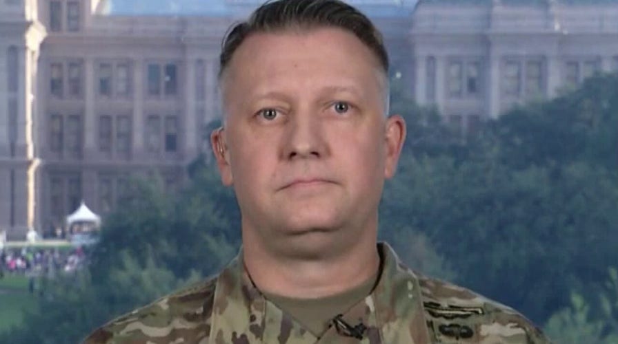 Texas military builds border fences to stem surge