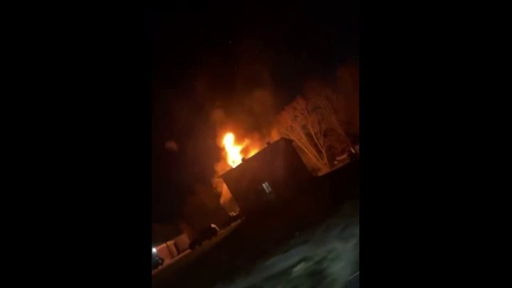 A NH building caught fire after a plane crashed into it 