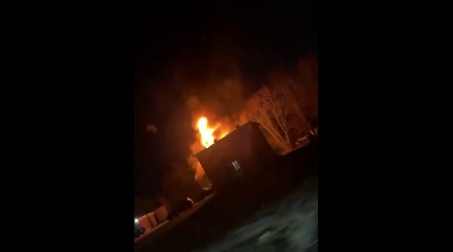 A NH building caught fire after a plane crashed into it 