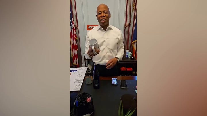NYC Mayor Eric Adams shares video on last day in office, reading a mug inscribed with his greatest quotes: 'Get your mug man!'